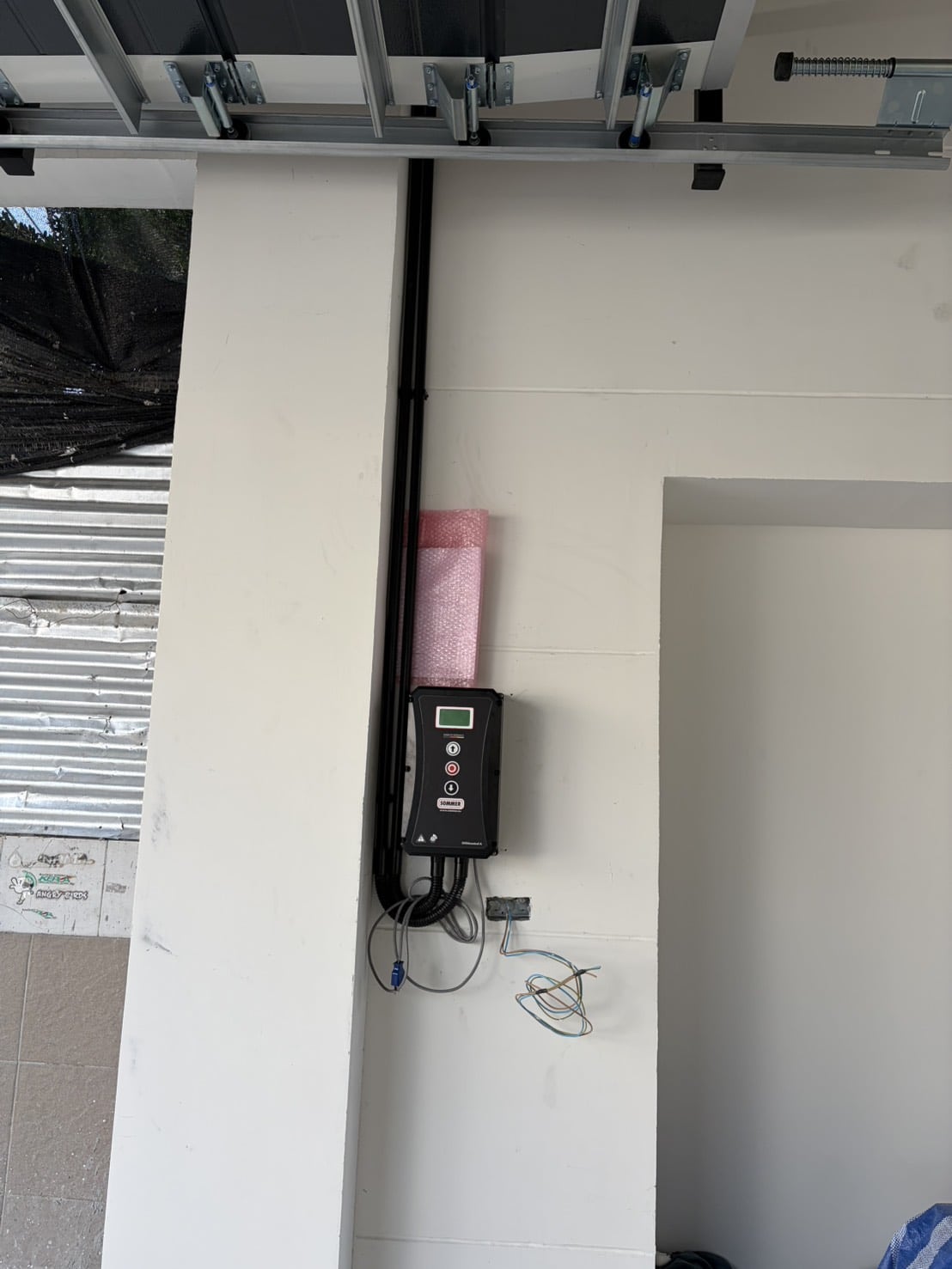 Installation photo of Garage Doors for Single House in Bangkok by OZ DOOR (8)
