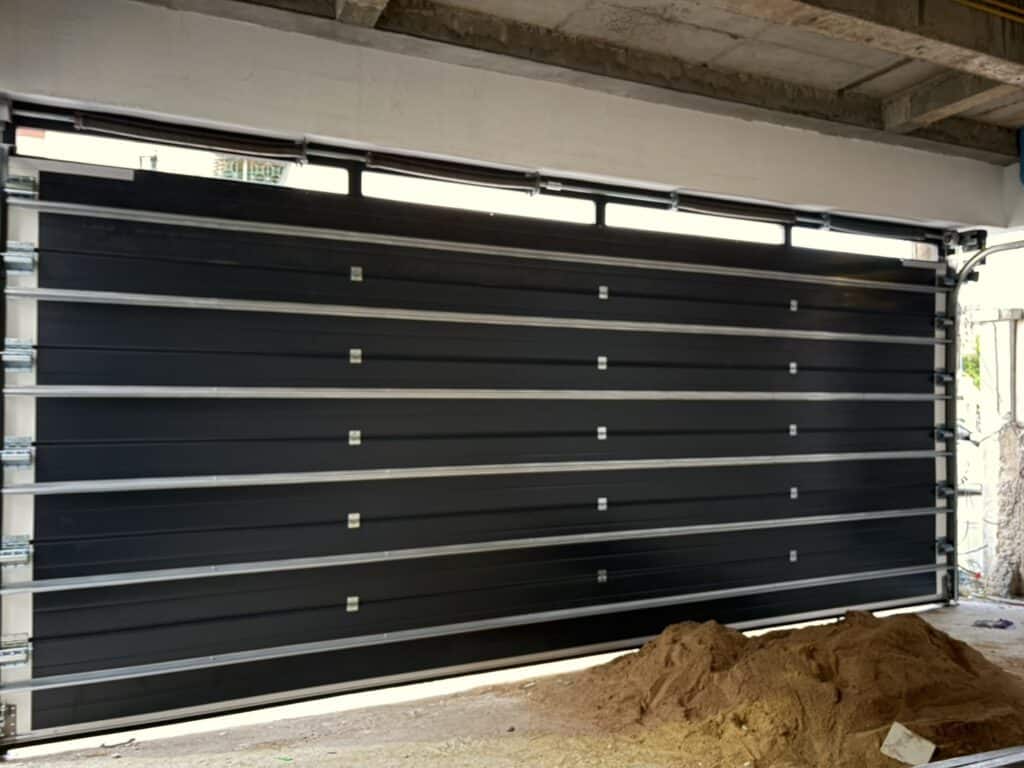 Installation photo of Garage Doors for Single House in Bangkok by OZ DOOR (9)