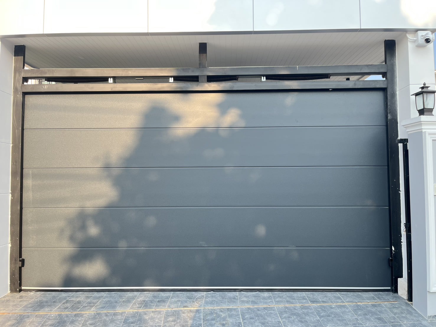Installation photo of Garage Doors for Single House in Chonburi by OZ DOOR