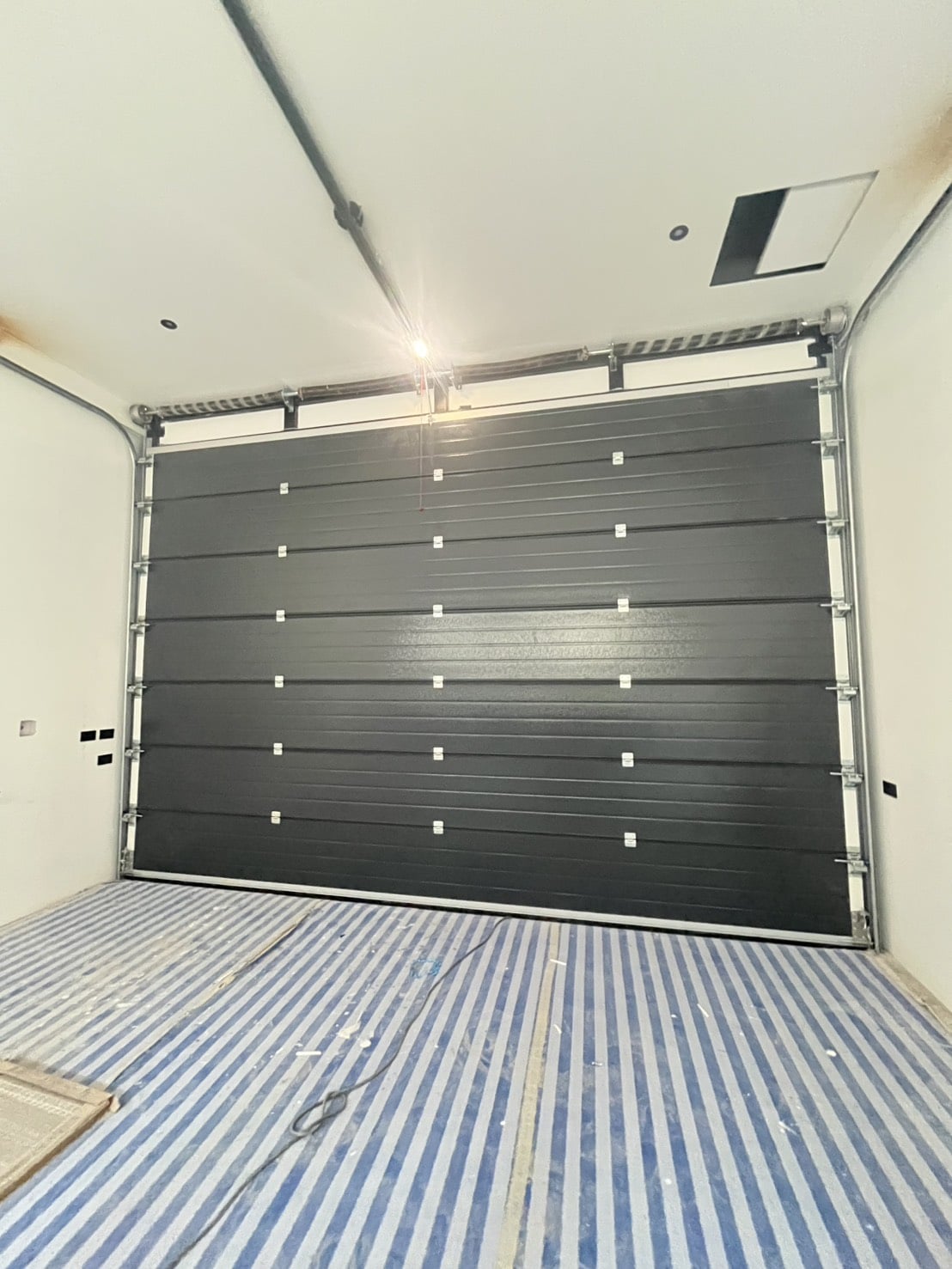 Installation photo of Garage Doors for Single House in Nonthaburi by OZ DOOR (4)