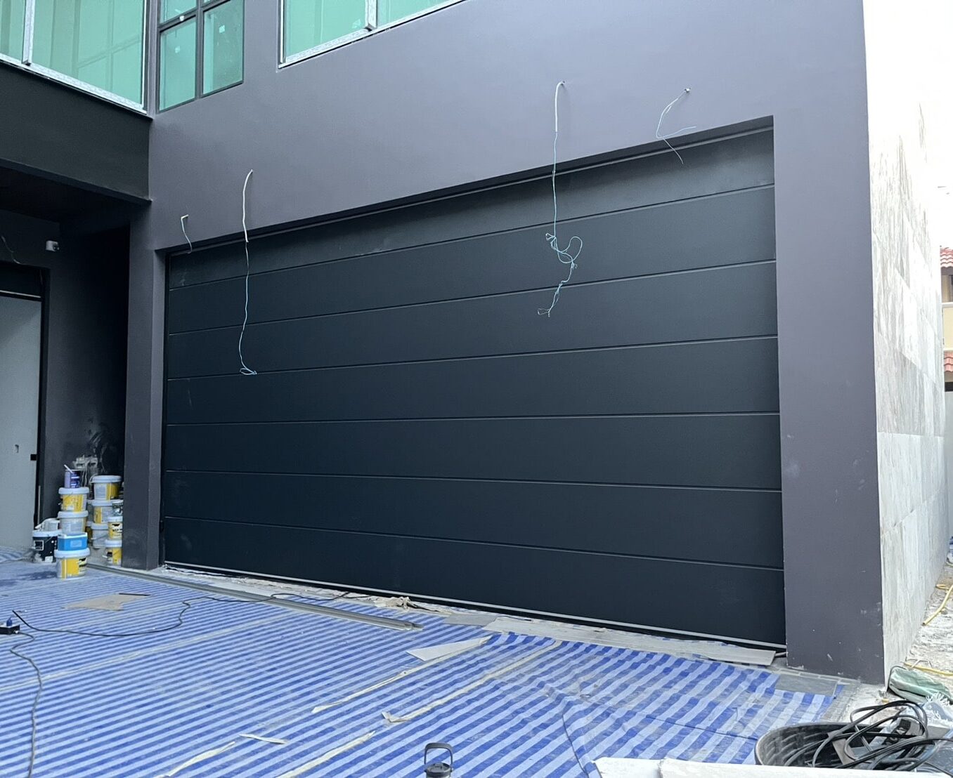 Installation photo of Garage Doors for Single House in Nonthaburi by OZ DOOR