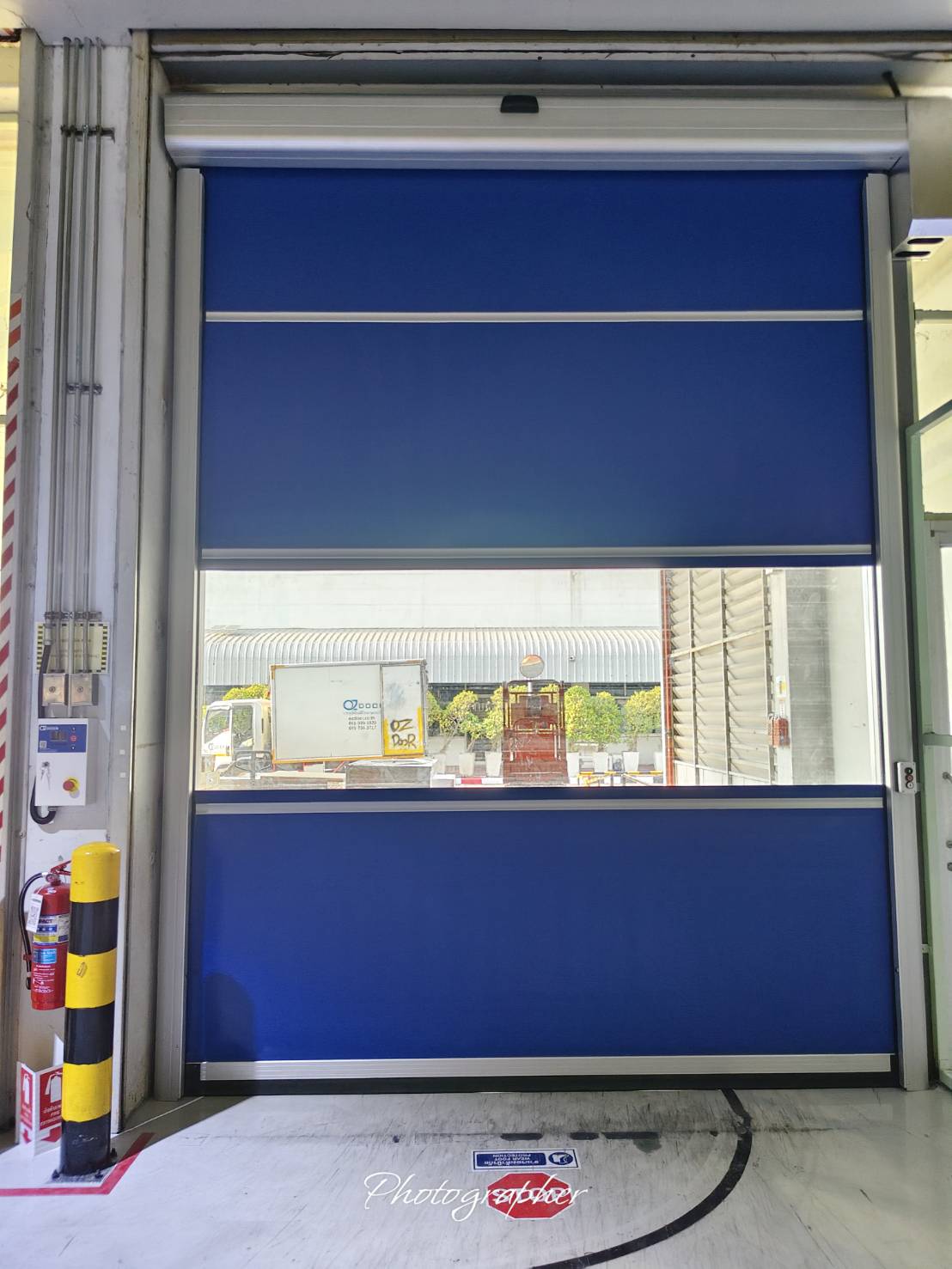 ภาพผลงานติดตั้งประตูไฮสปีด รุ่น Standard สำหรับโรงงานอุตสาหกรรม ที่ชลบุรี โดย OZ DOOR