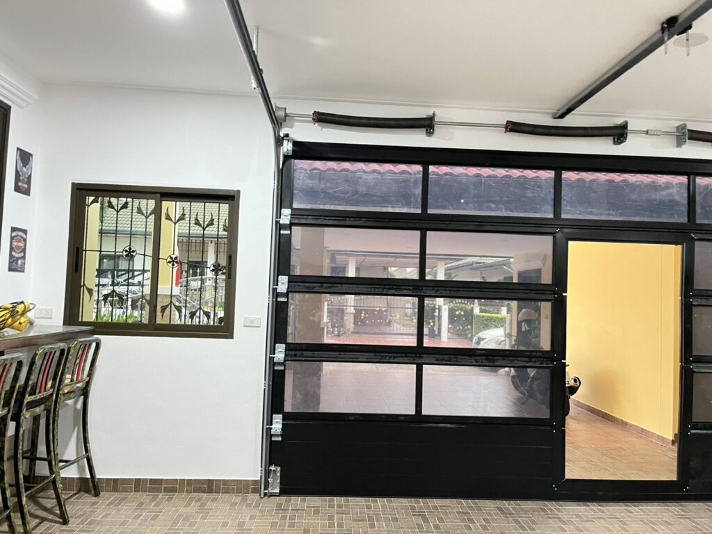 Installation photo of Full View Garage Door for Single House in Chonburi by OZ DOOR (4)