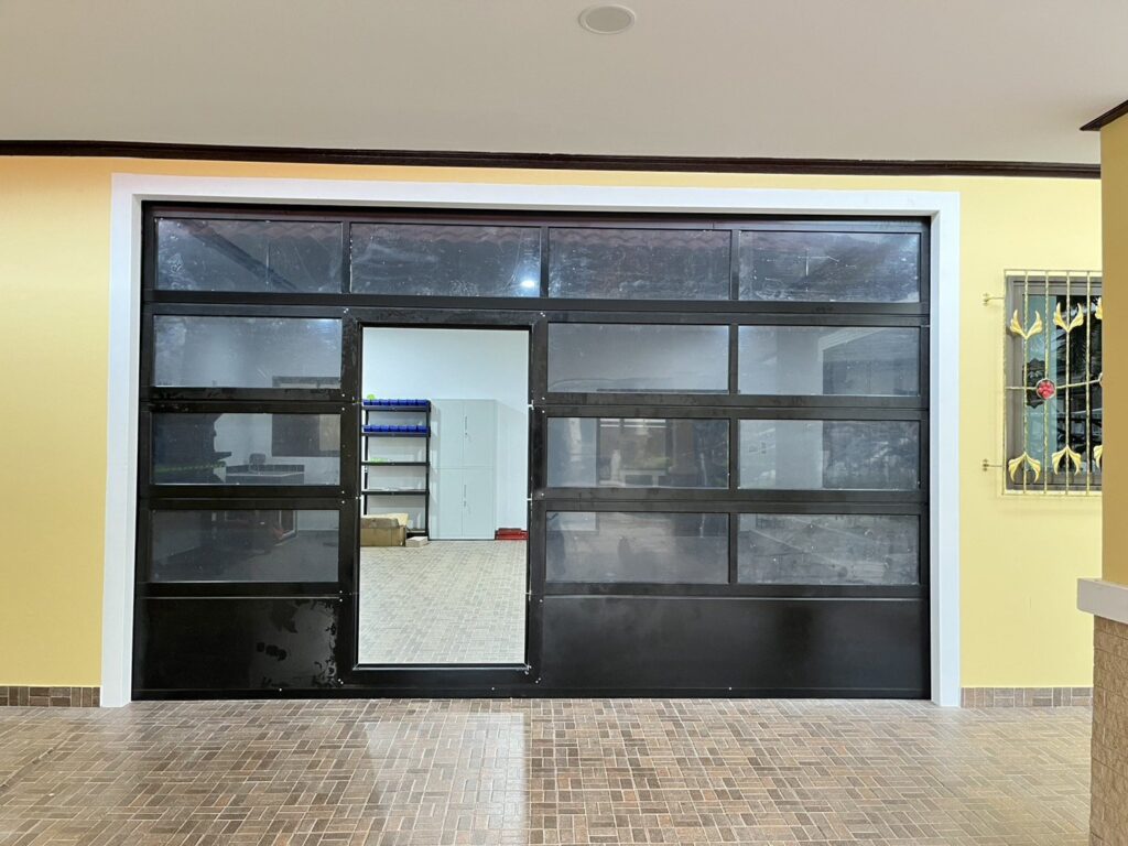 Installation photo of Full View Garage Door for Single House in Chonburi by OZ DOOR (2)
