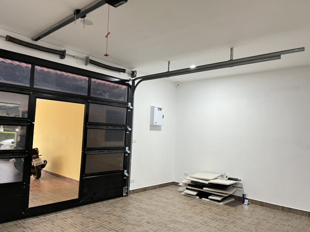 Installation photo of Full View Garage Door for Single House in Chonburi by OZ DOOR (3)