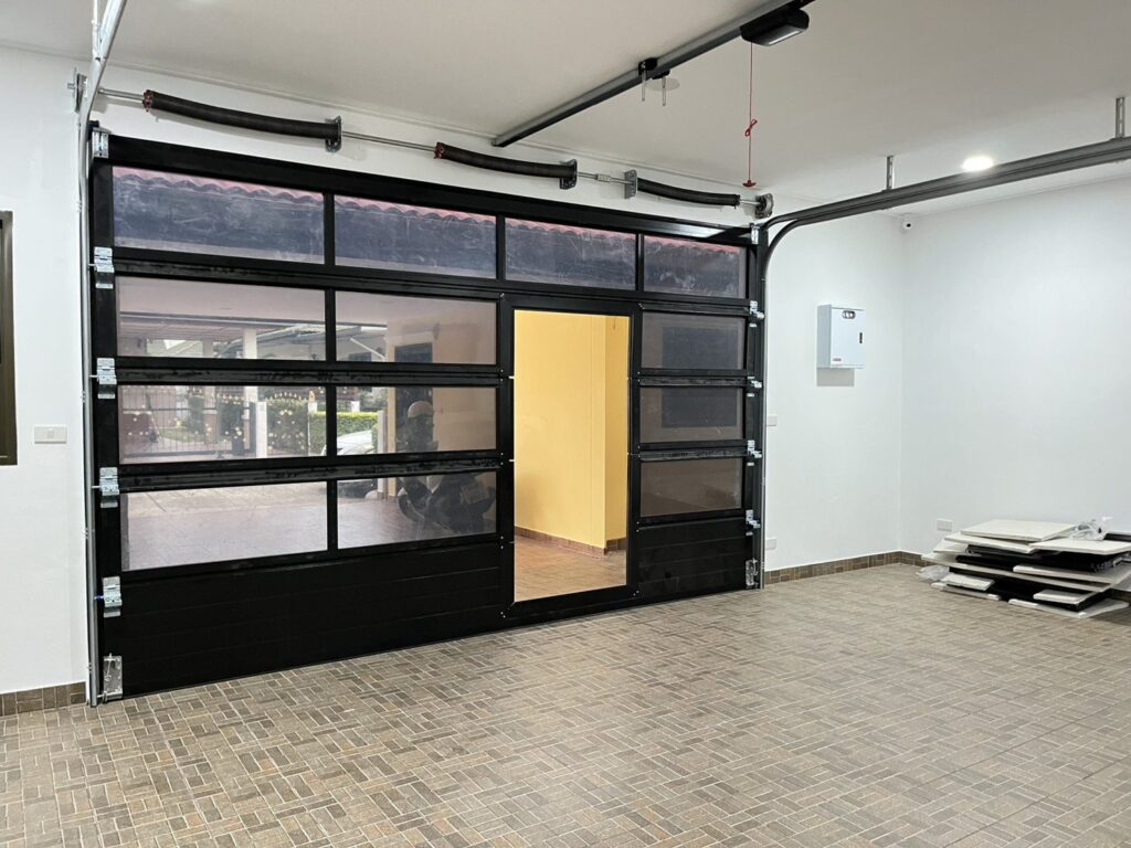 Installation photo of Full View Garage Door for Single House in Chonburi by OZ DOOR (5)