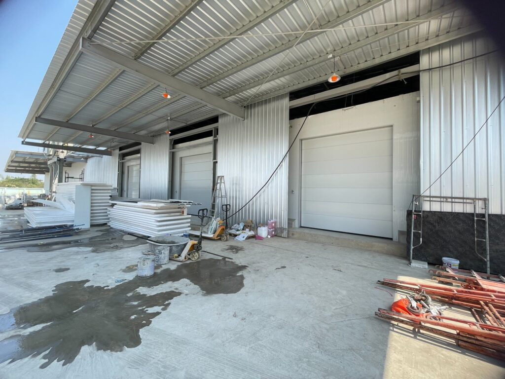 Installation photo of Overhead Doors for Manufacturing in Phetchaburi by OZ DOOR