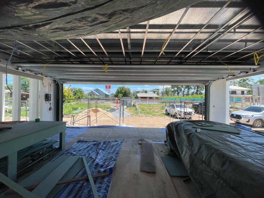 Installation photo of Standard Garage Door for Single House in Chonburi by OZ DOOR (4)