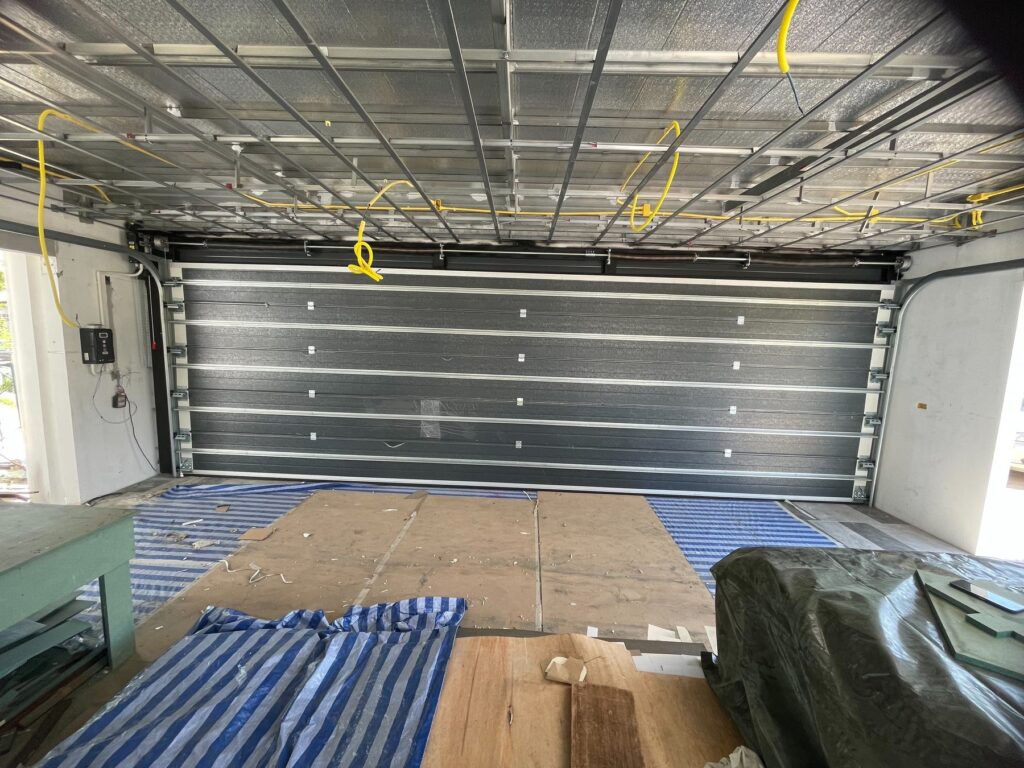 Installation photo of Standard Garage Door for Single House in Chonburi by OZ DOOR (2)