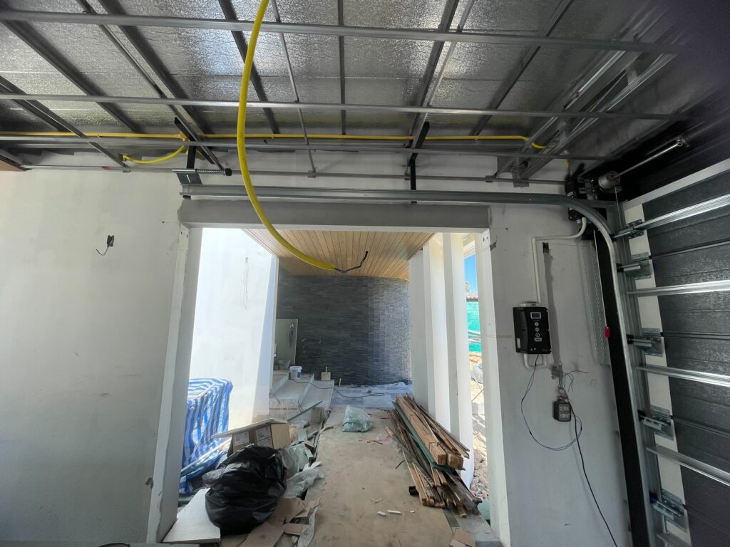 Installation photo of Standard Garage Door for Single House in Chonburi by OZ DOOR (3)