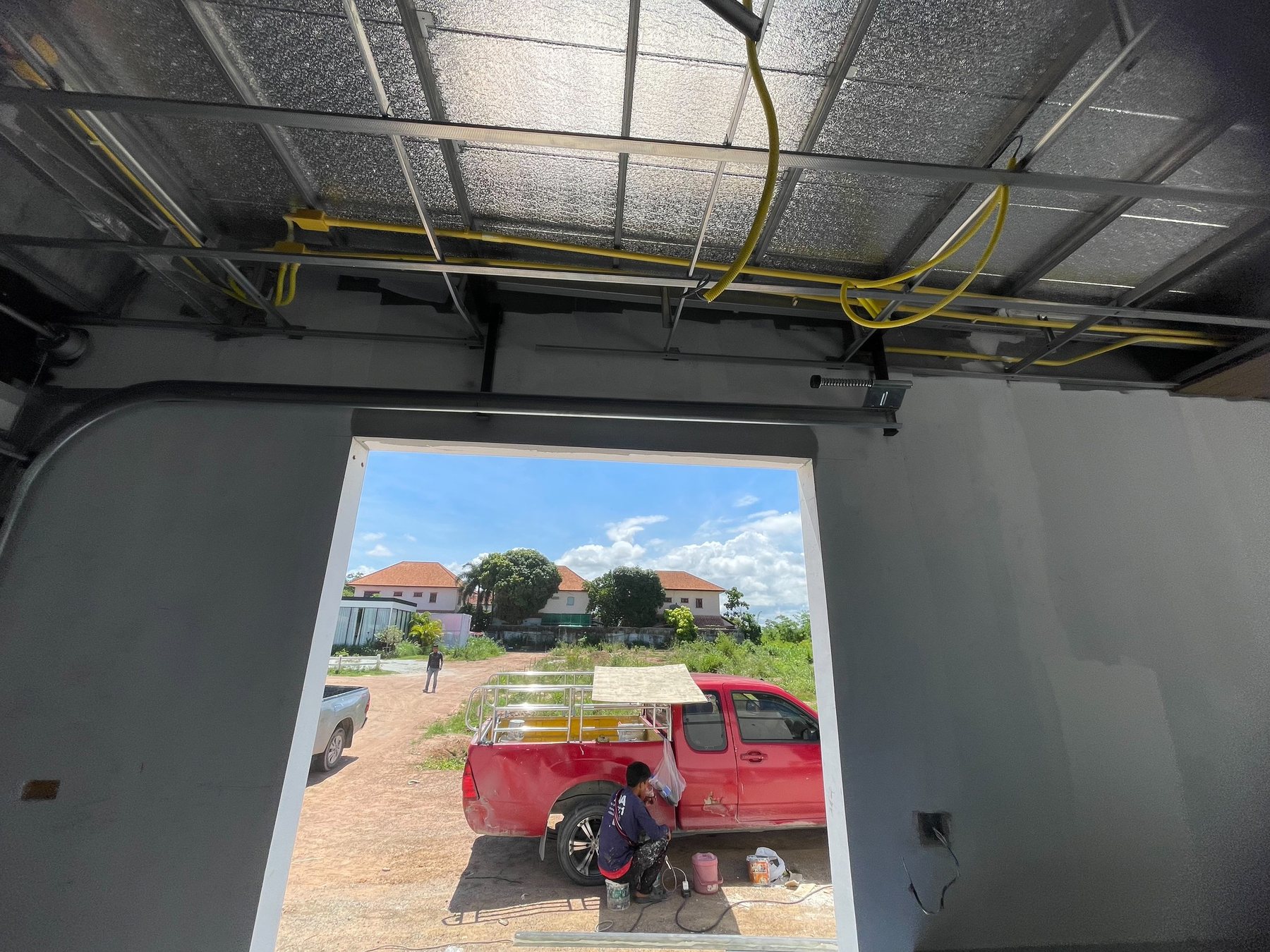 Installation photo of Standard Garage Door for Single House in Chonburi by OZ DOOR