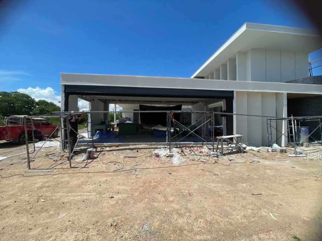 Installation photo of Standard Garage Door for Single House in Chonburi by OZ DOOR (5)