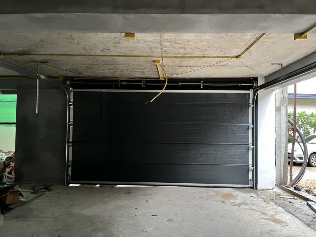 Installation photo of Standard Garage Door for Single House in Surat Thani by OZ DOOR (4)
