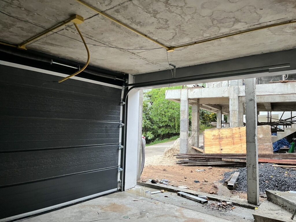 Installation photo of Standard Garage Door for Single House in Surat Thani by OZ DOOR (3)