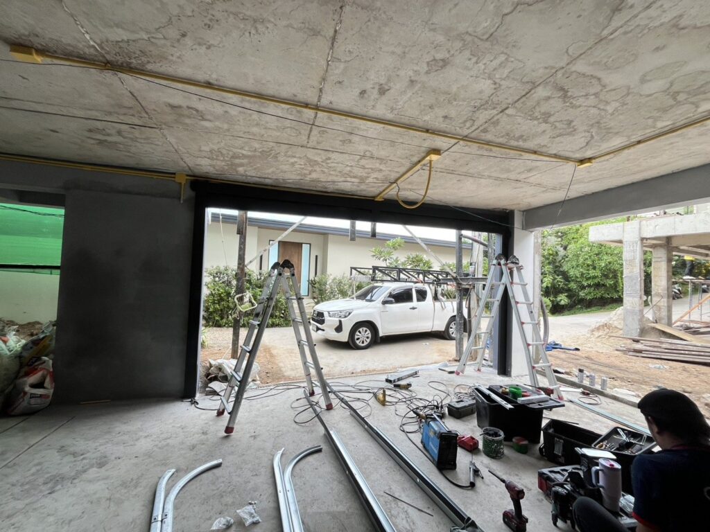 Installation photo of Standard Garage Door for Single House in Surat Thani by OZ DOOR (6)