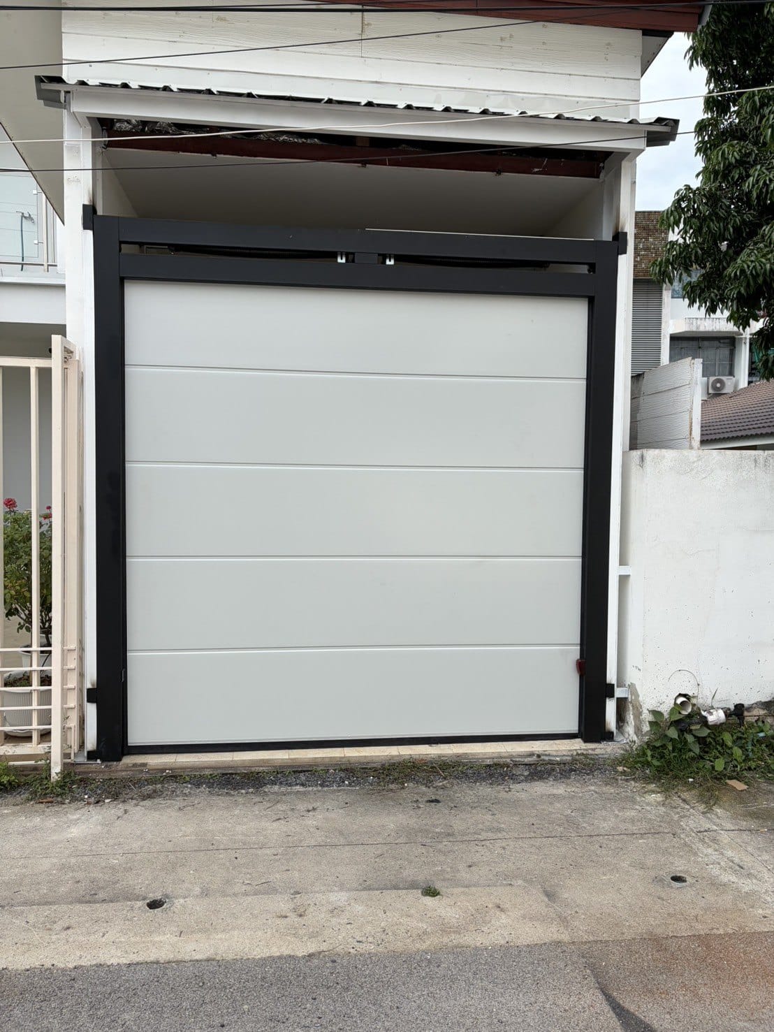 Installation photo of Garage Doors for Single House in Chiang Mai by OZ DOOR