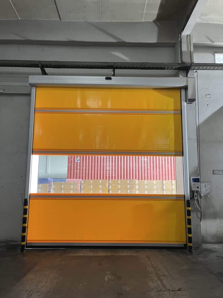 Yellow curtain and control unit beside the opening