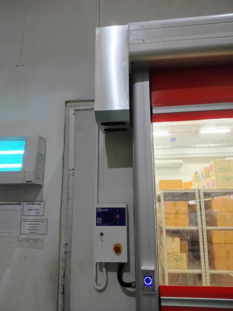 Upper red curtain and control cabinet beside the wall